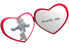 a heart shaped mirror with avafe.me written on the inside