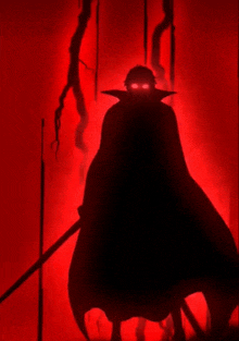 a silhouette of a person in a cape with red eyes