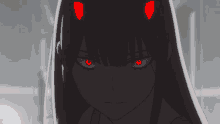 a girl with red horns on her head looks at the camera