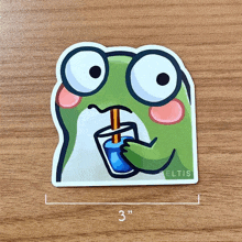 a sticker of a frog drinking a drink through a straw .