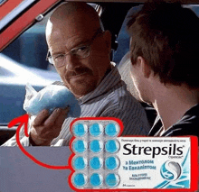 a man in a car holding a bag of strepsils next to another man