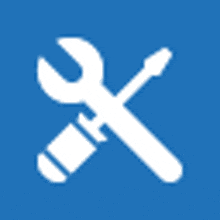 a white icon of a wrench and screwdriver on a blue background .