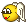 a pixel art illustration of a yellow smiley face with wings .