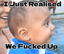 a baby is being held by a woman with a caption that says i just realised we fucked up