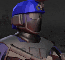 a man wearing a blue helmet and goggles holding a gun