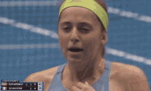 a close up of a woman 's face with the match point # 2 displayed on the screen