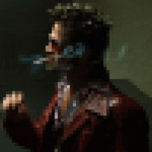 a pixelated image of a man smoking a cigarette in a dark room