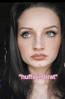 a close up of a woman 's face with the words " huffs in brat " on the bottom right