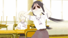 a girl is covering her ears in a classroom while another girl looks on