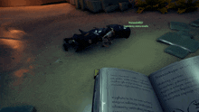 a screenshot of a video game shows a man laying on the ground with a name that starts with the letter n.