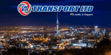 a picture of a city at night with the words vtd transport ltd we make it happen