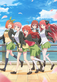 a group of anime girls standing next to each other on a balcony