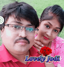 a man and a woman are posing for a picture with the words lovely jodi on the bottom