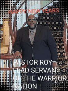 pastor roy lead servant of the warrior nation stands in front of a staircase