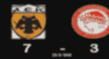 a blurred image of two logos with the number 7 and 3