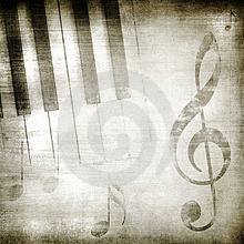 a piano keyboard with a treble clef and music notes in the background