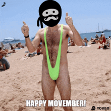 a man in a green slingshot on a beach with the words happy movember