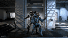 a video game called halo infinite has two soldiers standing next to each other in a hallway