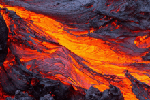 a close up of lava flowing through a rock