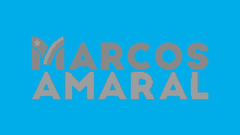 a blue background with marcos amaral written in gray