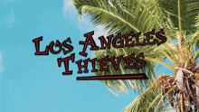 a palm tree with the words los angeles thieves written on it