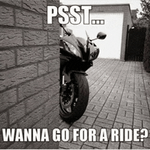 a motorcycle leaning against a brick wall with the caption psst ... wanna go for a ride