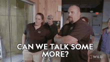 a group of people standing in a hallway with the words " can we talk some more " on the bottom