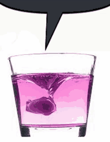 a glass filled with pink liquid with a speech bubble above it .