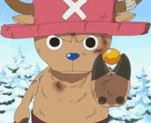 tony tony chopper from one piece is holding a candy in his hand .