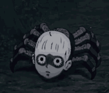 a cartoon spider with a face on it 's head