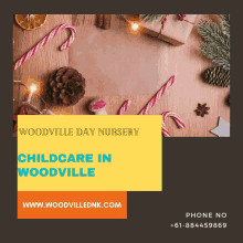 an advertisement for woodville day nursery with candy canes and pine cones on a wooden table