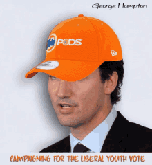 george hampton is campaigning for the liberal youth vote and is wearing an orange pods hat