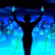 a silhouette of a person with their arms outstretched in front of a city at night