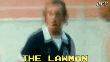 a blurry picture of a man with the words " the lawman " in yellow letters