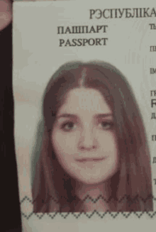 a woman 's face is on a passport that says passport