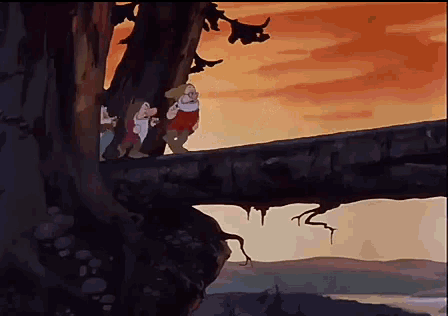 a couple of dwarfs standing on a tree branch with a sunset in the background