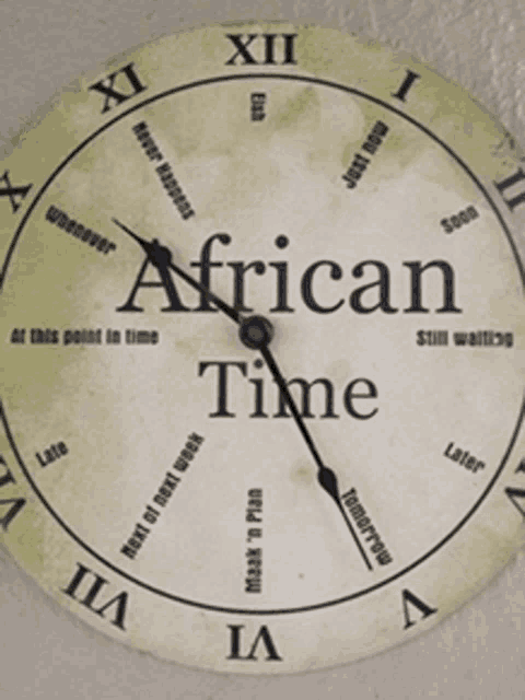 a clock that says african time on the face