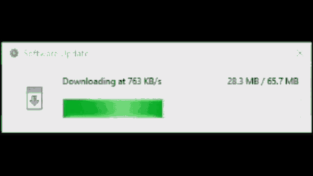 a computer screen shows that the software update is being downloaded at 740.9 kb / s