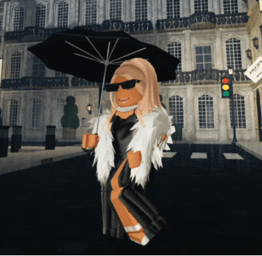 a woman holding an umbrella in front of a building that says prada on it