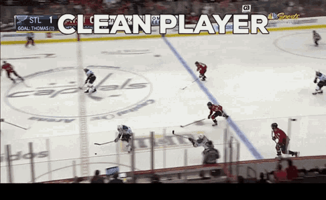 a hockey game is being played and the words clean player are above the ice