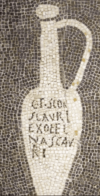 a mosaic of a bottle with the word excel written in black