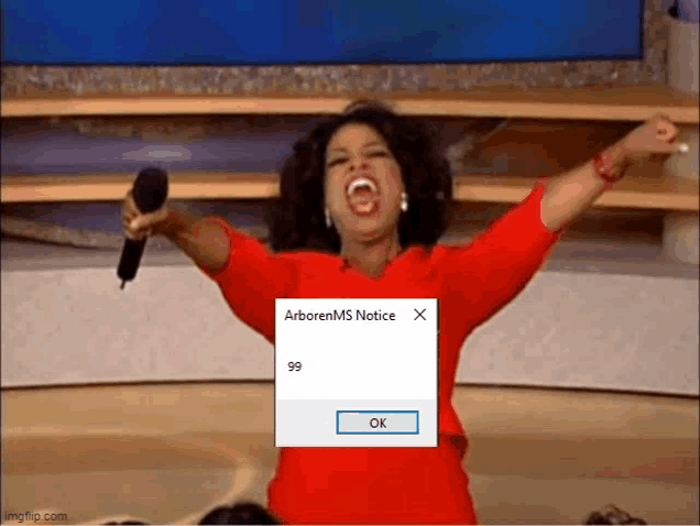 oprah winfrey is holding a microphone in front of a screen that says arborems notice