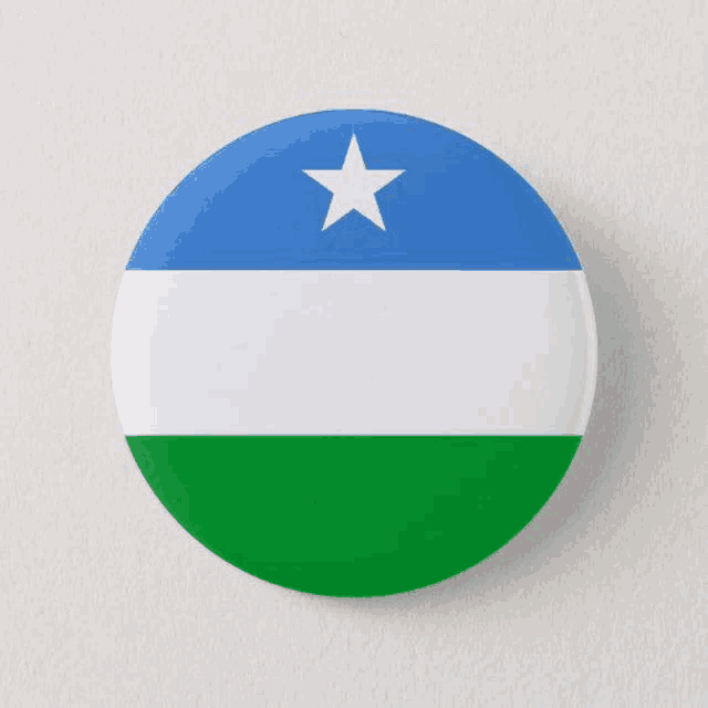 a button with the flag of somalia with a white star on top