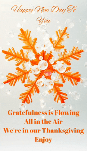 a happy new day to you greeting card with an orange snowflake and bubbles