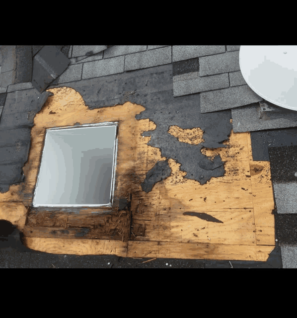 a skylight on a roof that has been destroyed