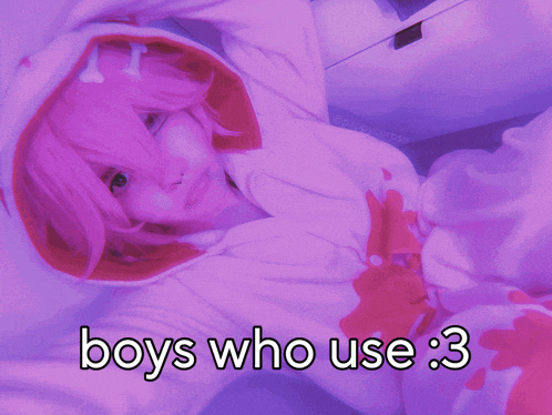 a girl in a pink hoodie with the words boys who use 3 below her