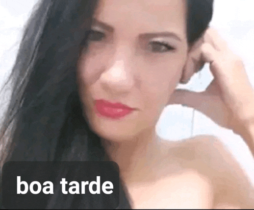 a close up of a woman 's face with the words boa tarde written below her