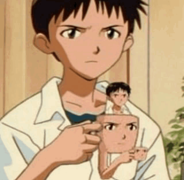 a cartoon boy is holding a picture of a person 's face in his hand .