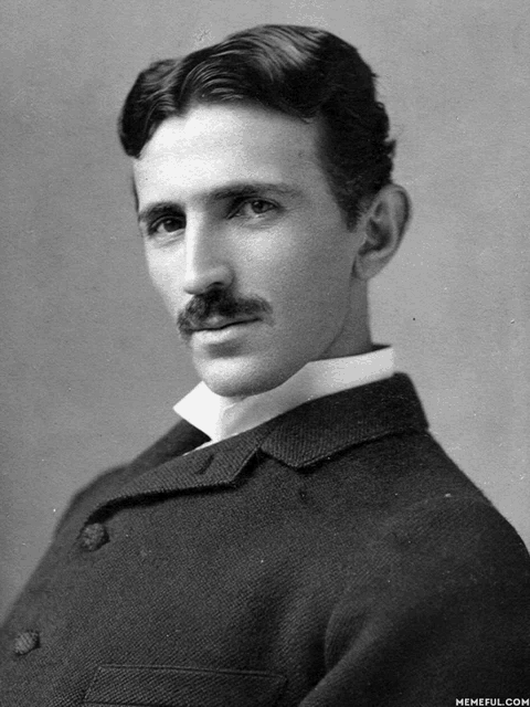 a black and white photo of a man with a mustache is taken by memeful.com