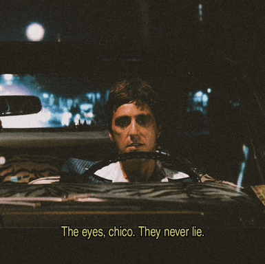 a man in a car with the words " the eyes chico they never lie "